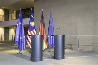 Lecterns and flags taken during a press conference between Federal Chancellor Olaf Scholz and Anwar