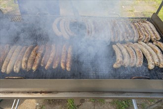 Roast sausages on a charcoal grill, church fair in Franconia, Bavaria, Germany, Europe