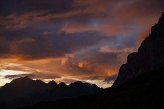 Montafon mountains with dramatic cloudy sky at sunset, Tschagguns, Rätikon, Montafon, Vorarlberg,