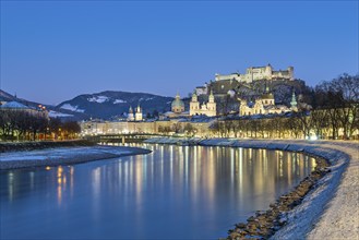 Salzburg in winter at the blue hour, Old Town, Cathedral, Fortress Hohen Salzburg, Salzach,