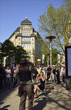 Germany, Hamburg, City, View to Spitalerstraße, Shops, Street cafe, Main shopping street, Magician