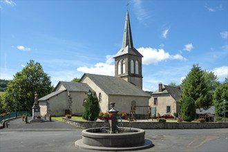 View of the church square in Espinchal village, Auvergne Volcanoes Regional Natural Park, Puy de