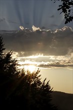 Sky with clouds and sunbeams, August, Germany, Europe