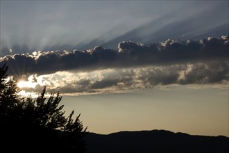 Sky with clouds and sunbeams, August, Germany, Europe