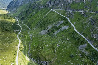 Mountain road up to Lac de Moiry, mountain lake and dam, final curves, Valais, Switzerland, Europe