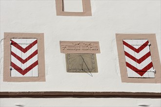 Sundial on a house facade, Lemgo, North Rhine-Westphalia, Germany, Europe