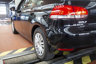 VW Golf on the brake test bench (brake test) during the main inspection