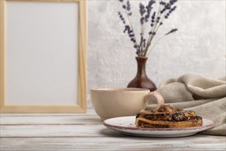 White wooden frame mockup with lavender in ceramic vase, linen textile, cup of coffee and bun on