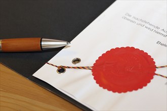 Notarised contract with red official seal