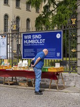 Tourists at the flea market stall in front of Humboldt University, Unter den Linden, Berlin,