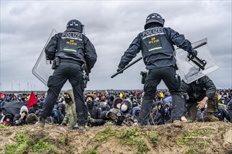 Violent clashes between thousands of demonstrators and the police, after a demonstration against