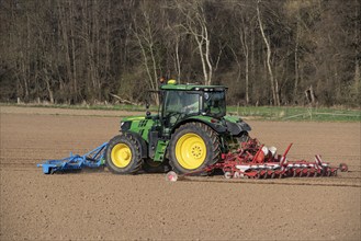 Sugar beet being sown in spring, precision sowing with precision seed drill, behind a tractor,