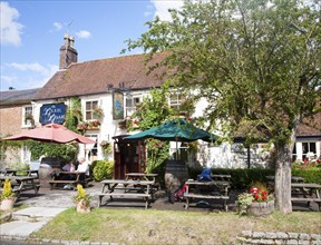 The historic Blue Boar pub on the village green in Aldbourne, Wiltshire, England, United Kingdom,