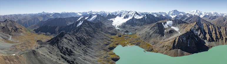 Mountain panorama, aerial view, 4000 metre peak with glacier, mountain pass and mountain lake