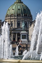 Amalienborg Palace, fountains in the Amalie Garden, dome of the Protestant Frederiks Kirke,