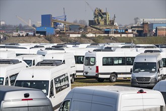 Duisburg-Ruhrort inland harbour, loading of new vehicles, Mercedes Benz minibuses, for export,