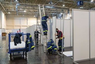 Construction of a vaccination centre for corona vaccinations, in a hall at Messe Essen, by the