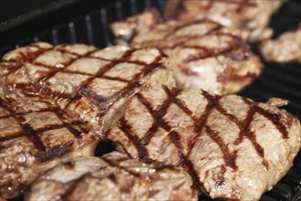 Steak on the grill with diamond pattern