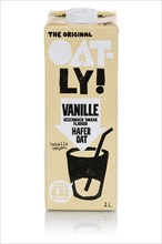 Oatly variety vanilla vegan oat milk cropped against a white background