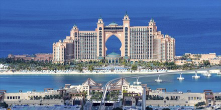 The Palm Jumeirah with Atlantis Hotel Panorama artificial island from above in Dubai, United Arab