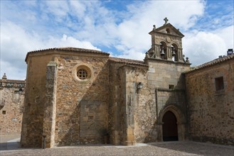 Historic church with stone walls under a blue sky, Convento de San Pablo, nunnery, old town,