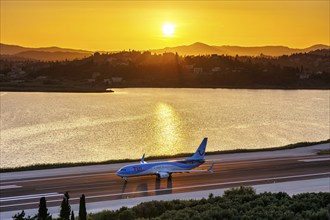 A TUI Boeing 737-800 aircraft with the registration G-FDZR at Corfu Airport, Greece, Europe