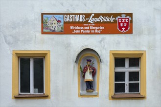 Figure of St Nepomuk in a niche at an inn, Sulzbach-Rosenberg, Upper Palatinate, Bavaria, Germany,