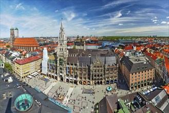 Aerial fish eye view of Munich, Marienplatz, Neues Rathaus and Frauenkirche from St. Peter's church