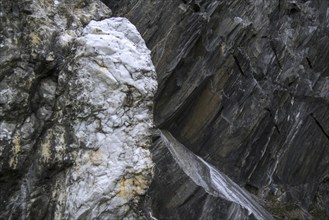 White quartz vein in rock face at the Ballachulish slate quarry in Lochaber, Highland, Scotland, UK