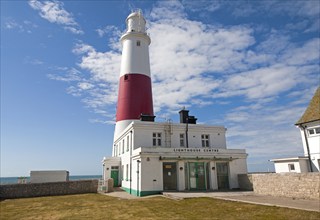 Red and white lighthouse on the coast at Portland Bill, Isle of Portland, Dorset, England, United