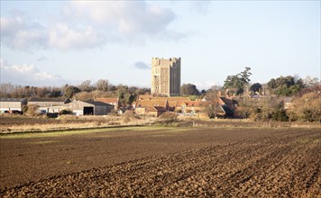 View of the village and castle looking across fields, Orford, Suffolk, England, United Kingdom,