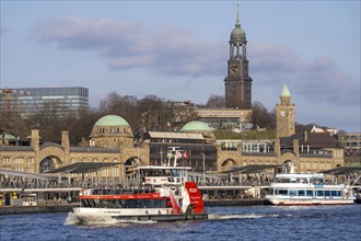 Hadag harbour ferry, on the Elbe, Landungsbrücken, main church St. Michaelis, Hamburg, Germany,