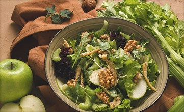 Fresh, Waldorf salad, celery stalk with chicken, apple and walnut, grapes, herbs, homemade, no