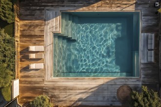 AI generated aerial view perpendicular top down of an wooden deck with a swimming pool at daylight