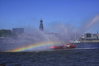 Europe, Germany, Hamburg, Elbe, View across the Elbe to the Michel, Fire boat in action at the