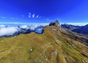 The Sas Rigais and Furchetta peaks of the Odle Group, drone shot, Val Gardena, Dolomites,