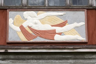 Pargeting plasterwork figure of a flying angel, Wyken Hall, Suffolk, England, UK