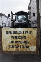 Tractor with sign, No one should ever forget, Farmers provide food, Farmers' protests, Düsseldorf,