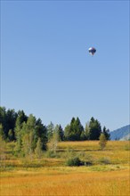 Hot air balloon over the Rothenthurm high moor in the canton of Schwyz, Switzerland, Europe