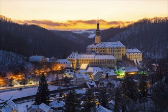 Winter evening in the Müglitz valley, impressively illuminated Weesenstein Castle at the blue hour,