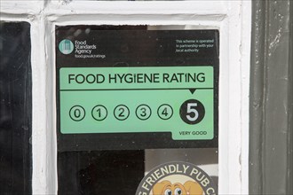 Food Standards Agency hygiene rating sign notice awarding five stars, Suffolk, England, Uk