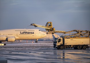 Winter at Frankfurt Main Airport, FRA, de-icing vehicles waiting for aircraft to be de-iced, Hesse,