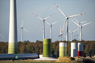 Construction site of a new wind turbine, modules of the tower, wind turbine from the manufacturer