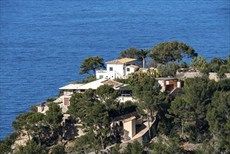 Villas on the cliffs in the north-west of the island, near Alconàsser, Serra de Tramuntana,