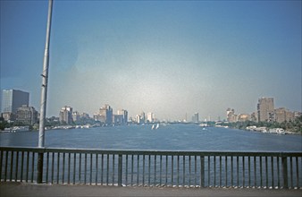 Nile with skyscrapers on the bank, bridge, Cairo, Egypt, September 1989, vintage, retro, old,