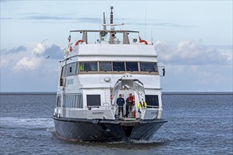 Excursion boat Adler Express docks, harbour, Strucklahnungshörn, Nordstrand, North Frisia,