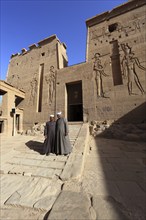 Temple of Isis, Temple of Isis at Philae on the island of Agilkia, two Arabs in front of the Temple