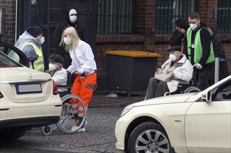 Vaccinees are taken to taxis after vaccination in the arena in Treptow, Berlin, 09/02/2021