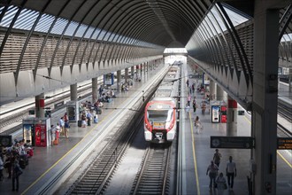 Train at platform inside Santa Justa railway station Seville, Spain, Europe