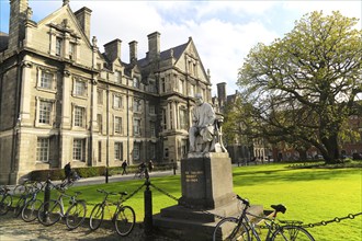 Graduates Memorial building and George Salmon statue, Trinity College university, city of Dublin,